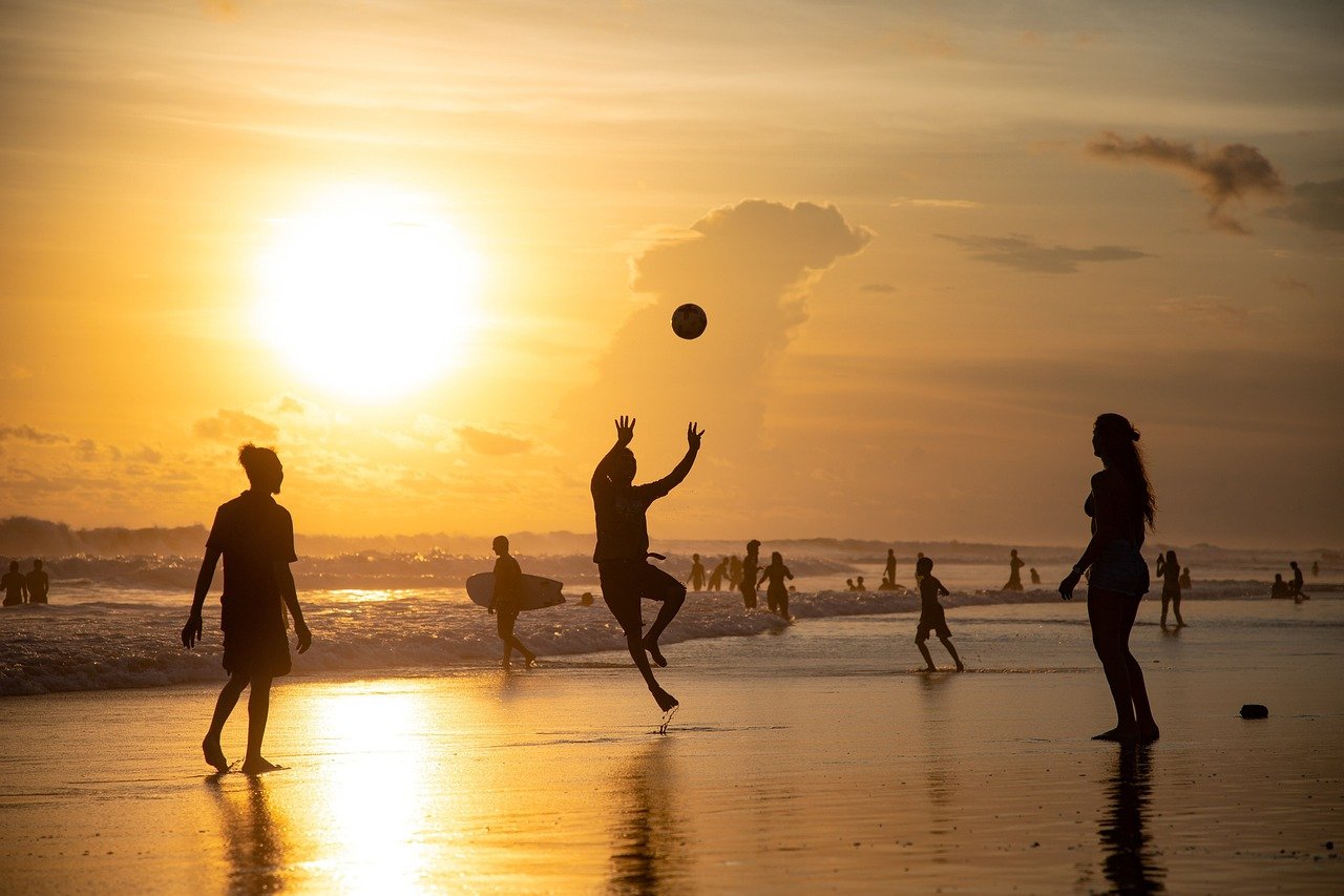 water volleyball at sunset